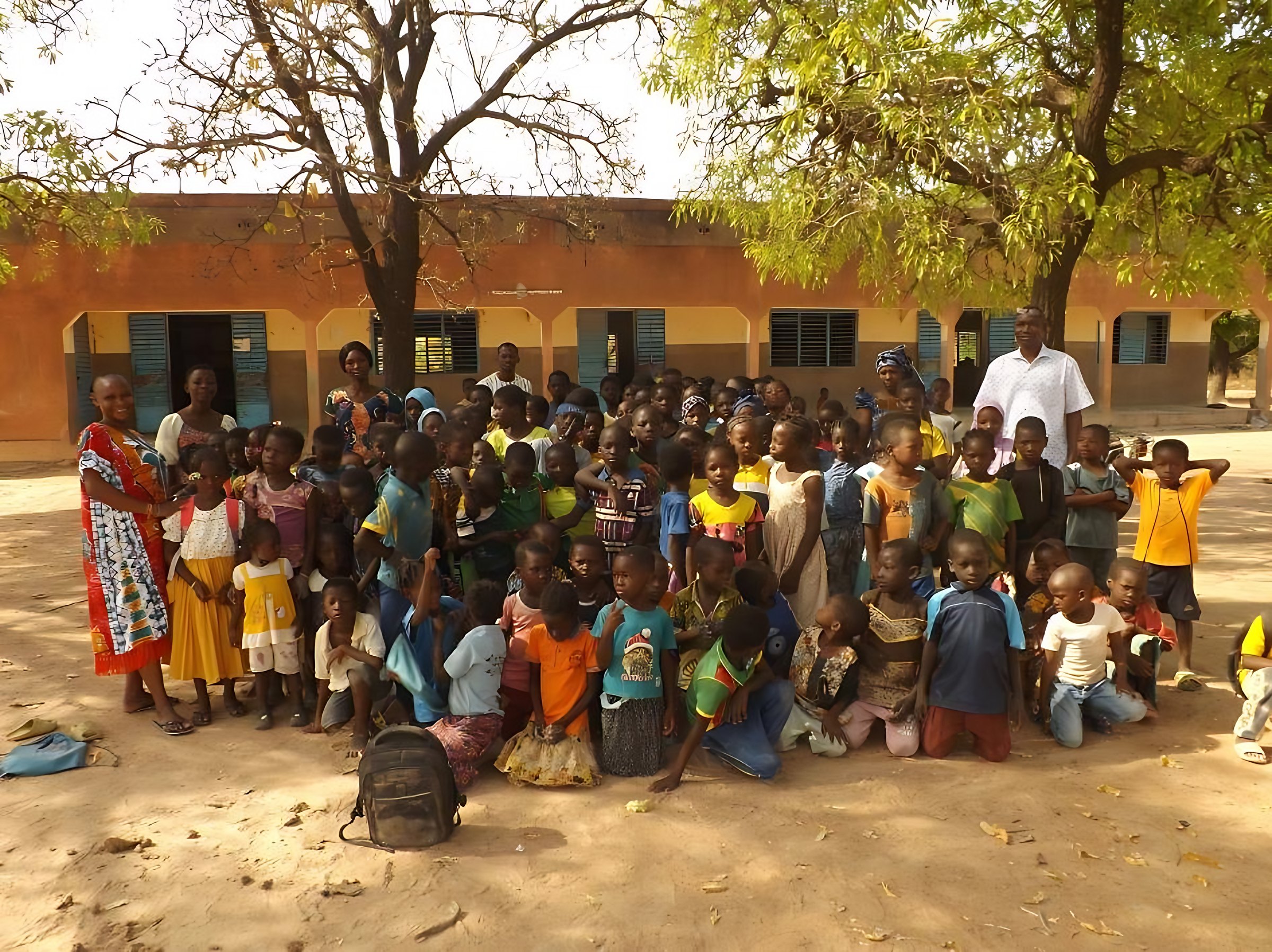 Students and teachers of SDK Primary School gathered in the school yard