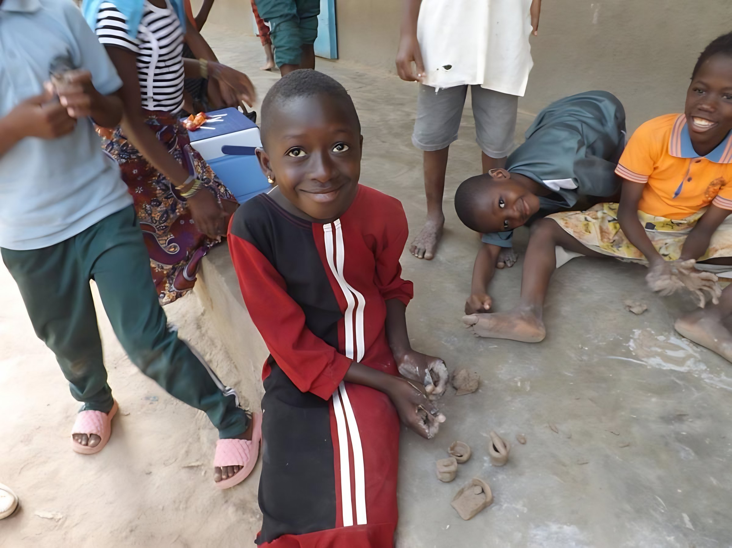 A student with clay crafts made at break time